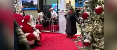 Mira el violento ataque de una mujer a un Papá Noel en centro comercial Mira el violento ataque de una mujer a un Papá Noel en centro comercial