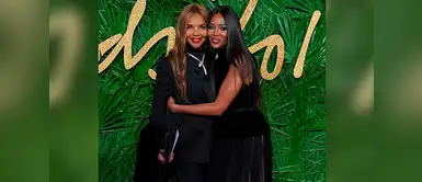 Naomi Campbell junto a su madre Valerie Morris, la actriz eligió para la noche un vestido de Azzedine Alaïa, con top de cuello cisne en terciopelo negro y falda plisada. Naomi Campbell junto a su madre Valerie Morris, la actriz eligió para la noche un vestido de Azzedine Alaïa, con top de cuello cisne en terciopelo negro y falda plisada.