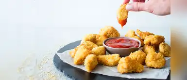 Deliciosos y crujientes nuggets de pollo con quinua caseros para compartir en familia Deliciosos y crujientes nuggets de pollo con quinua caseros para compartir en familia