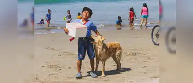 Piura: niño y su perrito conmueven al vender bodoques juntos en la playa Yacila Piura: niño y su perrito conmueven al vender bodoques juntos en la playa Yacila