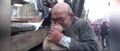 Abuelo se aferra a su gato tras perder todas sus pertenencias durante incendio Abuelo se aferra a su gato tras perder todas sus pertenencias durante incendio