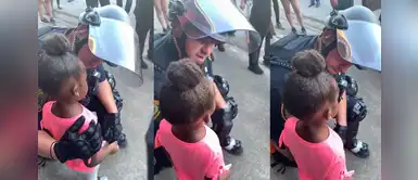 Conmovedor momento en que policía consuela a niña de 5 años que le preguntó si iba a dispararle Conmovedor momento en que policía consuela a niña de 5 años que le preguntó si iba a dispararle