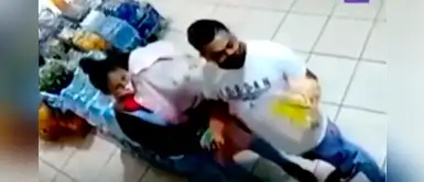 Pareja utiliza a bebé para disimular robo de minimarket Pareja utiliza a bebé para disimular robo de minimarket