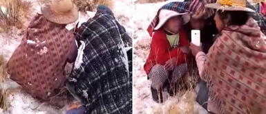 Madre protege a hijos de granizada para que no pierdan clases Madre protege a hijos de granizada para que no pierdan clases