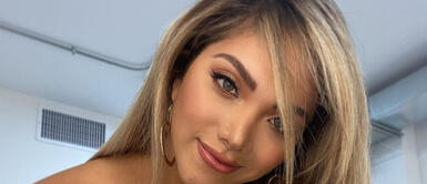 Isabel Acevedo derrocha sensualidad con vestido guinda Isabel Acevedo derrocha picardía con osado vestido para video de orquesta Zona Libre