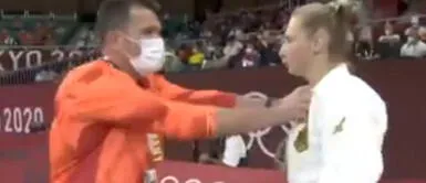 La competidora alemana contestó a las críticas de redes sociales. Entrenador de judoca Martyna Trajdos es criticado tras zarandearla y abofetearla antes de su pelea