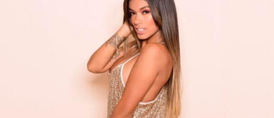 Shirley Arica y vestido satinado Shirley Arica se impone con glamour gracias a un eléctrico mini vestido satinado