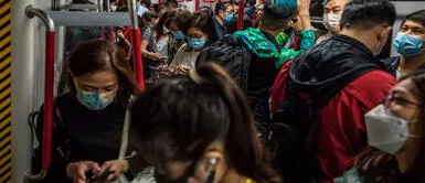 Aumentan contagios en varias ciudades de China. China confina a casi 30 millones de personas por brote récord de COVID-19