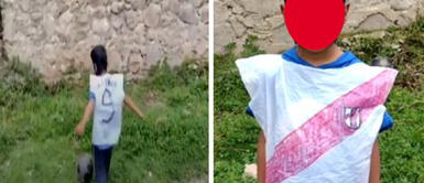 Niño hace camiseta con bolsa plástica Niño hace camiseta con bolsa plástica
