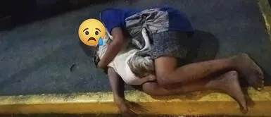 Niño filipino duerme en la calle y se consuela con el abrazo de su perro Niño no soporta el frío y se consuela con el abrazo de su perro: "Viven en la calle"