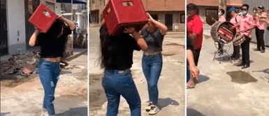 Peruana escuchó que pasaba una banda: decide salir con una caja de cerveza y sorprende con peculiar baile Peruana escuchó que pasaba una banda: decide salir con una caja de cerveza y sorprende con peculiar baile