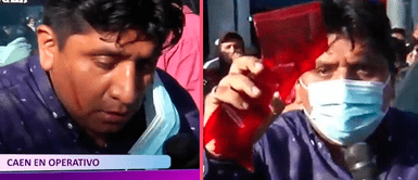 Informales atacan a reportero hasta sacarle sangre frente a la policía mientras realizaba EN VIVO Informales atacan a reportero hasta sacarle sangre frente a la policía mientras realizaba EN VIVO