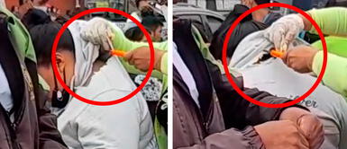 Postulante a San Marcos evita ser reportada por vestir con capucha y se lo cortan en plena calle Postulante a San Marcos evita ser reportada por vestir con capucha y se lo cortan en plena calle | VIDEO