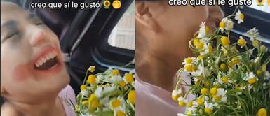 La joven se mostró emocionada al recibir el ramo de manzanillas. Joven no consigue flores amarillas, pero regala manzanilla a su pareja: "Lo importante es la intención"