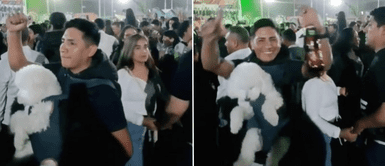 El perrito lució emocionado junto a su amo. El perrito lució emocionado junto a su amo.