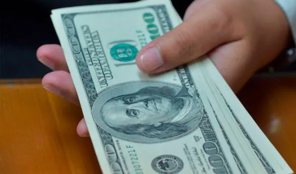 Precio del dólar podría descender sin la incertidumbre política. Foto: AFP