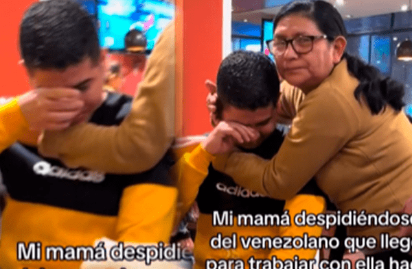 Venezolano llora como un niño en los brazos de su jefa peruana tras volver a su país